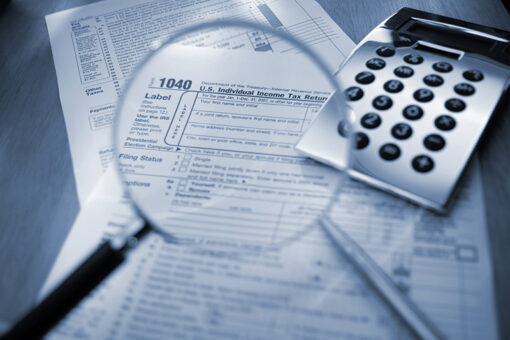 Calculator on top of financial documents